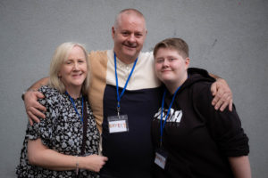 Our member Tony, his wife Sian and his daughter Megan at Headway East London for our brain injury conference in October 2023.