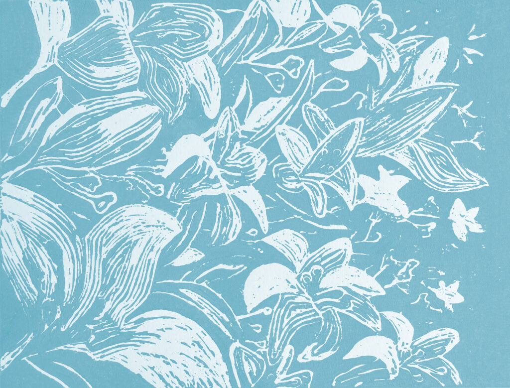 A lino print showing white leaves and flowers on a blue background.