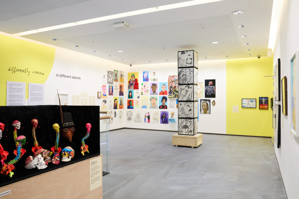 A big room with colourful artworks. 