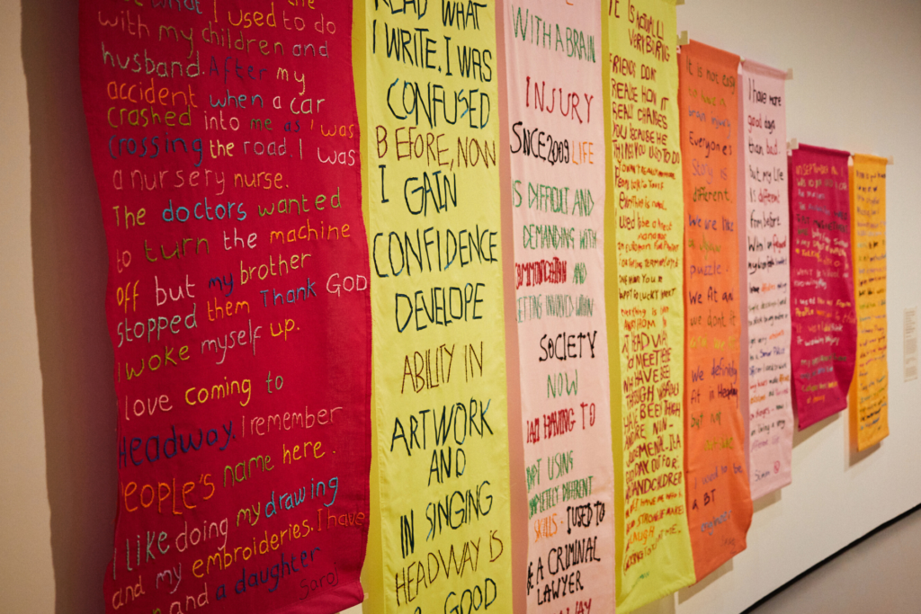 A series of eight embroidered banners exhibited at the Barbican for our differently various exhibition. Each banner is different in colours and text. Each of them tells the story of a survivor of brain injury.